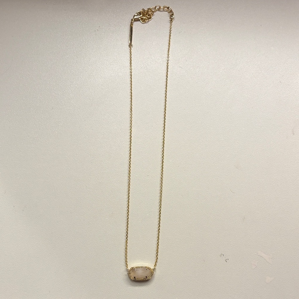 Kendra Scott Gold Necklace with very light pink stone